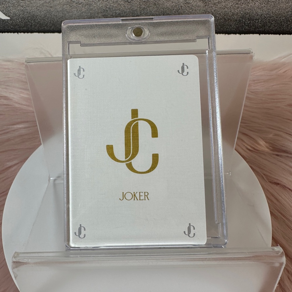 Jimmy ChooGold and White JC Joker Card